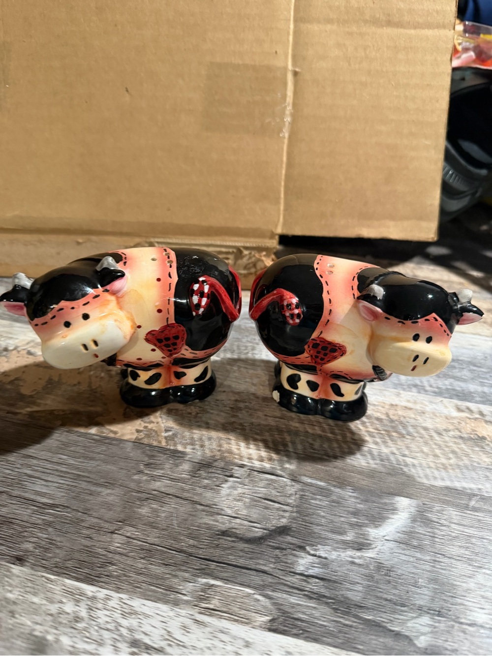 Black and Peach Cow Salt and Pepper Shakers